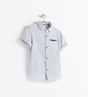 camisa detalle en bolsillo 